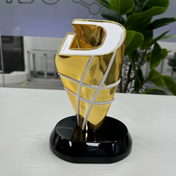 Gold and white custom trophy on a round black base